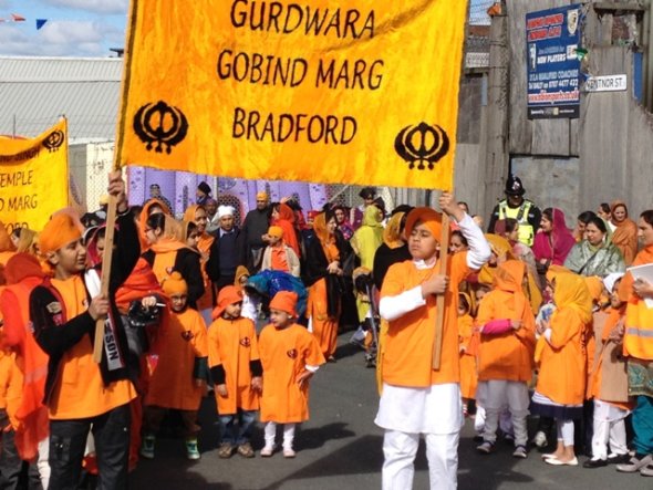 Children wearing the winning T-Shirt design